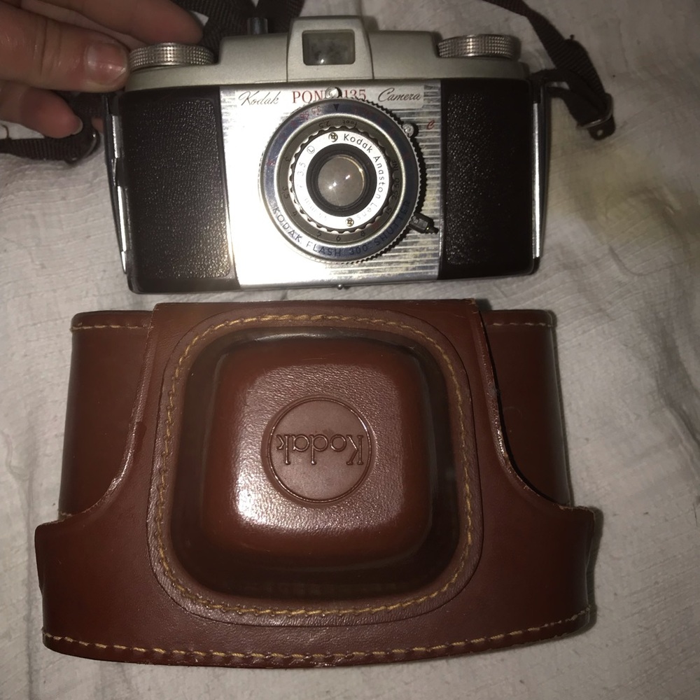 Vintage Kodak camera with antique tri pod
